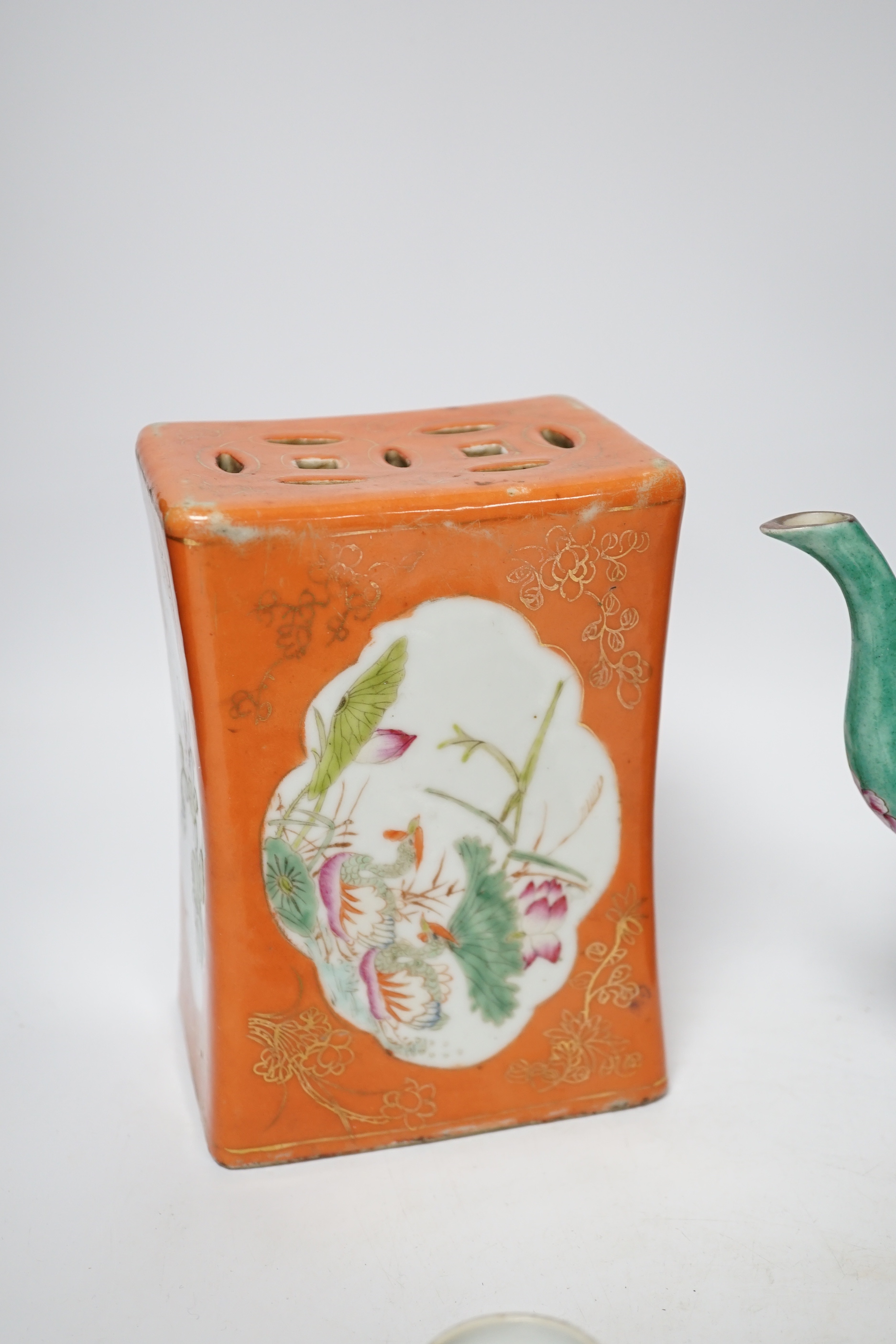 A Chinese Straits enamelled porcelain teapot and cover and seven similar tea bowls, Guangxu period and a pillow, teapot 18cm high including cover